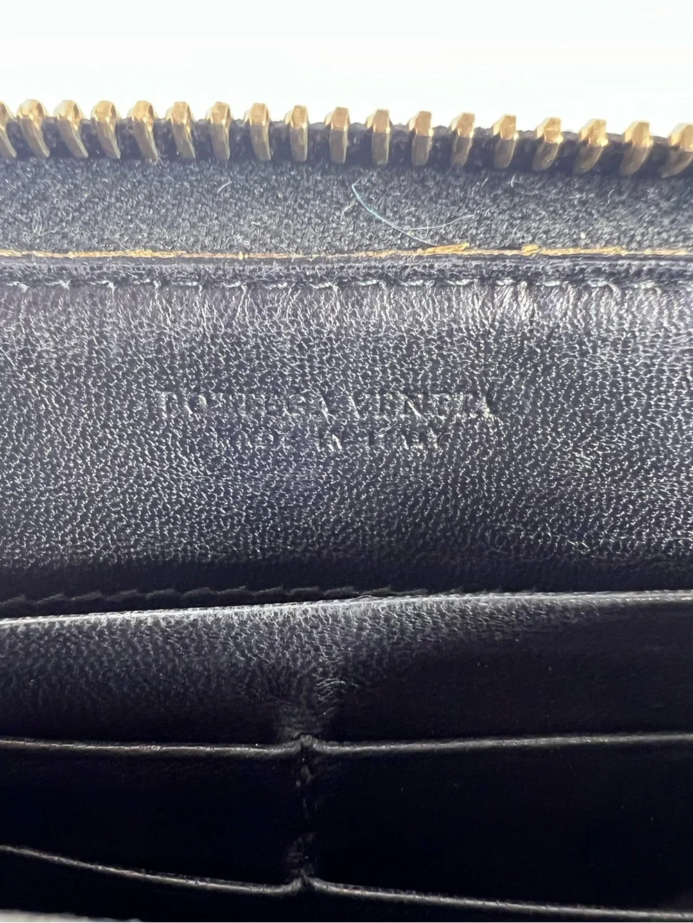1259: Bottega Veneta Intrecciato Zip Around Leather Continental Wallet